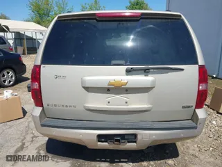 2012 Chevrolet Suburban LT with VIN 1GNSCJE03CR128206, listed as a IAAI auction lot 42002119 with 329,078 mi miles. Bid and sale history available at carsss.com. Image 16.