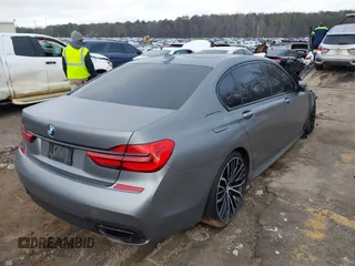 2018 BMW 7 Series 750i with VIN WBA7F0C55JGM23778, listed as a IAAI auction lot 41446517 with 88,498 mi miles. Bid and sale history available at carsss.com. Image 4.