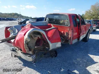 2000 Ford F-150 XL with VIN 1FTRX18L1YNC06272, listed as a IAAI auction lot 41780486 with 295,611 mi miles. Bid and sale history available at carsss.com. Image 4.