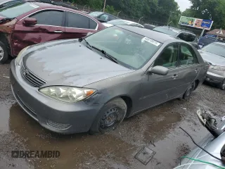 2005 Toyota Camry STD z VIN 4T1BE32K65U574267, wystawiony jako Copart lot #60810075 z przebiegiem 296 877 mil mil oraz Szkoda całkowita • Salvage title. Historia ofert i sprzedaży dostępna na DreamBid. Obrazek 1.