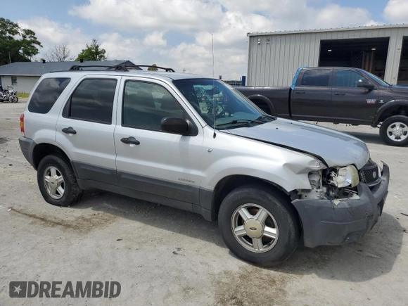 2002 Ford Escape XLT Choice with VIN 1FMYU03142KA49202, listed as a Copart auction lot 56359445 with Not provided miles and Clean title. Bid and sale history available at DreamBid. Image 4.