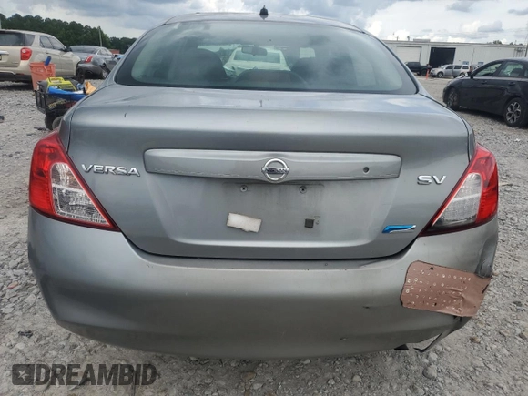 2012 Nissan Versa SV with VIN 3N1CN7AP8CL850021, listed as a Copart auction lot 60979605 with 238,261 mi miles and Salvage title. Bid and sale history available at DreamBid. Image 6.