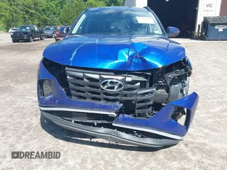 2023 Hyundai Tucson SEL with VIN 5NMJBCAE3PH227560, listed as a IAAI auction lot 42394447 with 51,725 mi miles and . Bid and sale history available at DreamBid. Image 12.