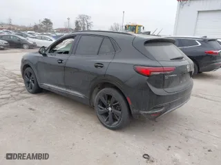 2021 Buick Envision Essence with VIN LRBFZPR42MD099979, listed as a IAAI auction lot 41557999 with 80,572 mi miles. Bid and sale history available at carsss.com. Image 3.