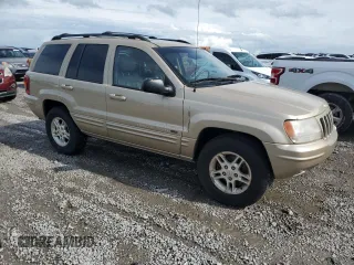2000 Jeep Grand Cherokee Limited with VIN 1J4GW58N7YC327607, listed as a Copart auction lot 54711615 with 108,241 mi miles and Salvage title. Bid and sale history available at DreamBid. Image 4.