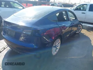2021 Tesla Model 3 Long Range with VIN 5YJ3E1EB6MF990089, listed as a IAAI auction lot 41607316 with 25,223 mi miles and . Bid and sale history available at DreamBid. Image 4.