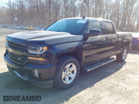 2018 Chevrolet Silverado 1500 LT with VIN 1GCUKREC3JF119906, listed as a IAAI auction lot 41765398 with 122,472 mi miles and . Bid and sale history available at DreamBid. Image 17.