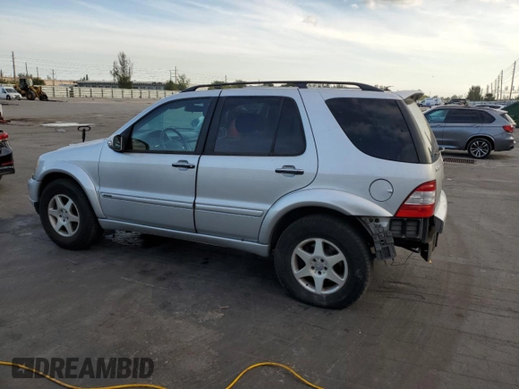 2002 Mercedes-Benz M-Class with VIN 4JGAB75EX2A326747, listed as a Copart auction lot 82106664 with 264,245 mi miles and Salvage Title. Bid and sale history available at carsss.com. Image 2.