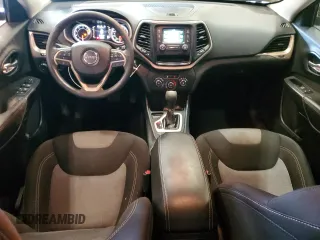 2016 Jeep Cherokee Altitude z VIN 1C4PJLAB2GW177394, wystawiony jako Copart lot #57840255 z przebiegiem 147 962 mil mil oraz Nie do naprawy • Non repairable. Historia ofert i sprzedaży dostępna na DreamBid. Obrazek 8.