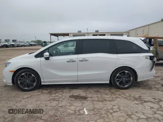 2022 Honda Odyssey Elite z VIN 5FNRL6H96NB039950, wystawiony jako IAAI lot #41907106 z przebiegiem 67 490 mil mil oraz . Historia ofert i sprzedaży dostępna na DreamBid. Obrazek 14.