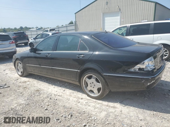 2001 Mercedes-Benz S-Class with VIN WDBNG70J51A197809, listed as a Copart auction lot 68633494 with 145,040 mi miles and Salvage Title. Bid and sale history available at carsss.com. Image 2.