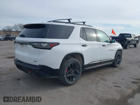 2018 Chevrolet Traverse Premier z VIN 1GNEVJKW0JJ229036, wystawiony jako IAAI lot #41866737 z przebiegiem 126 794 mil mil oraz . Historia ofert i sprzedaży dostępna na DreamBid. Obrazek 4.