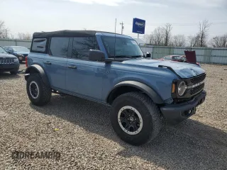2023 Ford Bronco with VIN 1FMEE5DP0PLB17111, listed as a Copart auction lot 53201215 with 26,093 mi miles and Salvage Title. Bid and sale history available at DreamBid. Image 4.