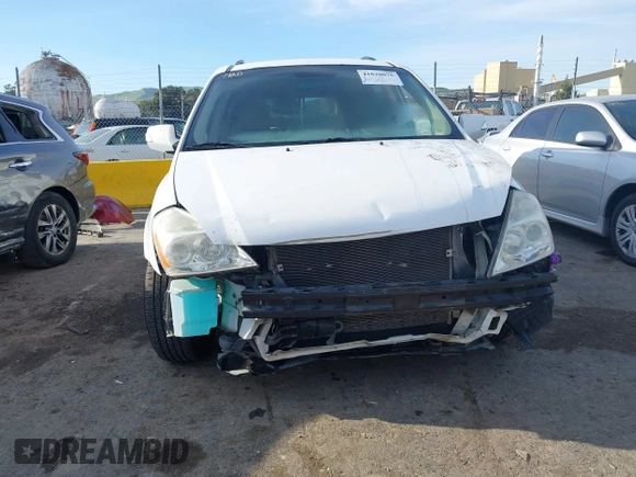 2011 Kia Sedona LX with VIN KNDMG4C74B6376150, listed as a IAAI auction lot 41820075 with 182,568 mi miles. Bid and sale history available at carsss.com. Image 6.