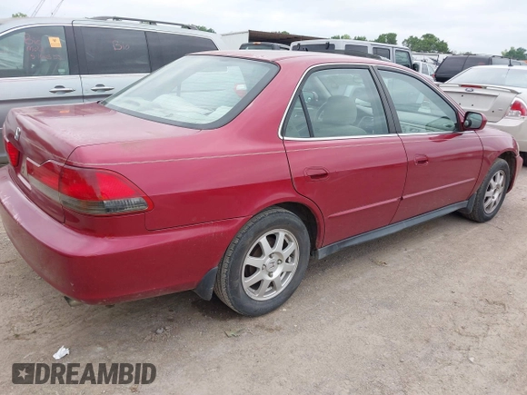 2002 Honda Accord SE z VIN 1HGCG56712A043965, wystawiony jako IAAI lot #42287036 z przebiegiem 342 437 mil mil oraz . Historia ofert i sprzedaży dostępna na DreamBid. Obrazek 4.