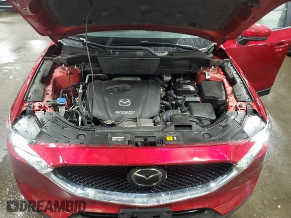 2018 Mazda CX-5 Touring z VIN JM3KFBCM5J0462676, wystawiony jako Copart lot #57892015 z przebiegiem 76 566 mil mil oraz Szkoda całkowita • Salvage title. Historia ofert i sprzedaży dostępna na DreamBid. Obrazek 12.