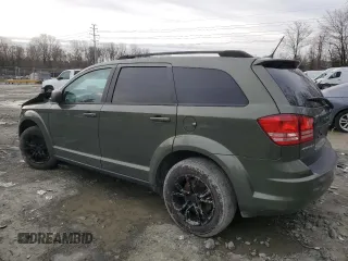 2018 Dodge Journey SE with VIN 3C4PDCAB7JT445621, listed as a Copart auction lot 43879445 with 100,700 mi miles and Salvage Title. Bid and sale history available at carsss.com. Image 2.