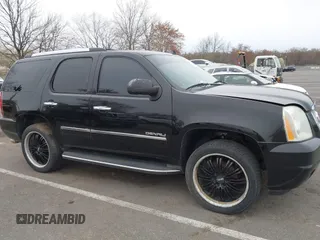 2012 GMC Yukon Denali with VIN 1GKS2EEF5CR129160, listed as a IAAI auction lot 42012417 with 221,871 mi miles. Bid and sale history available at carsss.com. Image 18.