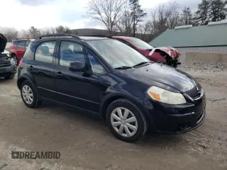 2010 Suzuki SX4 with VIN JS2YB5A37A6300500, listed as a Copart auction lot 48039085 with 143,806 mi miles and Clean Title. Bid and sale history available at DreamBid. Image 4.