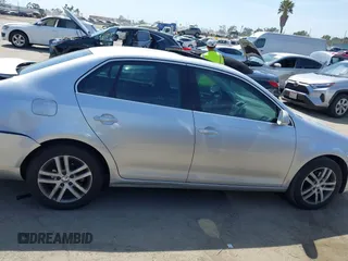 2005 Volkswagen Jetta 2.5 with VIN 3VWSG71K35M628391, listed as a IAAI auction lot 42302550 with 143,565 mi miles and . Bid and sale history available at DreamBid. Image 13.
