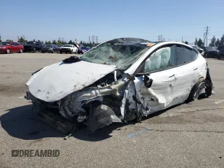 2023 Tesla Model Y Long Range z VIN 7SAYGDEE3PA077841, wystawiony jako Copart lot #54535215 z przebiegiem Nie podano mil oraz Szkoda całkowita • Salvage title. Historia ofert i sprzedaży dostępna na DreamBid. Obrazek 1.
