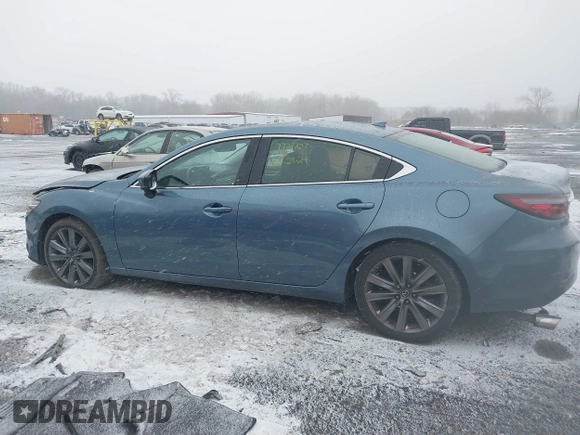 2018 Mazda 6 Grand Touring with VIN JM1GL1TY5J1330614, listed as a IAAI auction lot 41354444 with 100,744 mi miles and . Bid and sale history available at DreamBid. Image 14.