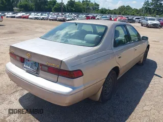 1997 Toyota Camry LE with VIN JT2BG22K4V0084080, listed as a IAAI auction lot 42566043 with 167,774 mi miles and . Bid and sale history available at DreamBid. Image 4.
