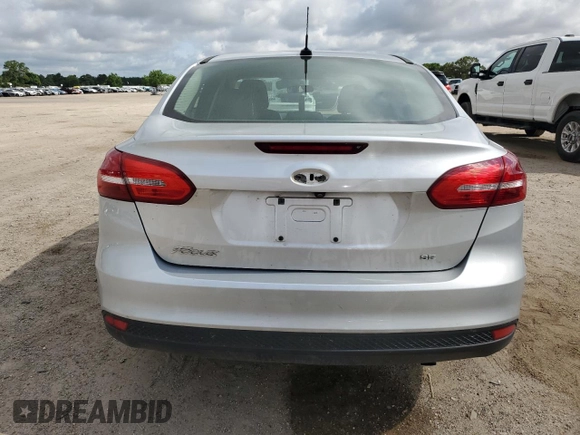 2017 Ford Focus SE with VIN 1FADP3F23HL328312, listed as a Copart auction lot 57028125 with 116,498 mi miles and Salvage title. Bid and sale history available at DreamBid. Image 6.
