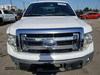 2014 Ford F-150 XL with VIN 1FTFW1CT1EKE22892, listed as a Copart auction lot 61635265 with 14,203 mi miles and Salvage title. Bid and sale history available at DreamBid. Image 5.