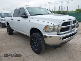 2014 Ram 2500 Tradesman z VIN 3C6UR5CLXEG253721, wystawiony jako IAAI lot #42159395 z przebiegiem 157 904 mil mil oraz . Historia ofert i sprzedaży dostępna na DreamBid. Obrazek 1.