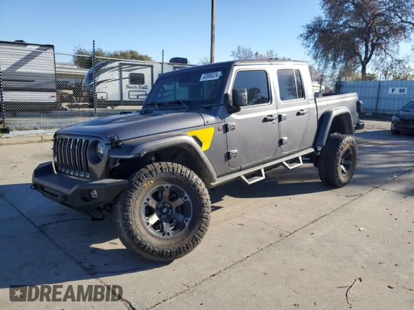 2021 Jeep Gladiator Rubicon с VIN 1C6JJTBM4ML594204, выставлен на аукционе Copart как лот 83998224 с пробегом 25 852 миль миль и Списание • Salvage title. История ставок и продаж доступна на DreamBid. Изображение 1.