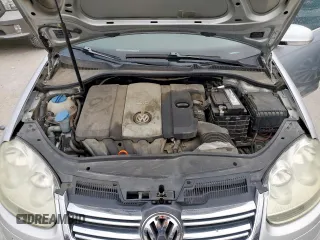 2008 Volkswagen Jetta SE z VIN 3VWRM71K98M063043, wystawiony jako Copart lot #50171755 z przebiegiem 151 740 mil mil oraz Szkoda całkowita • Salvage title. Historia ofert i sprzedaży dostępna na DreamBid. Obrazek 11.