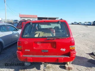 1998 Jeep Grand Cherokee Laredo with VIN 1J4GZ48Y6WC290798, listed as a IAAI auction lot 41816161 with 299,875 mi miles. Bid and sale history available at carsss.com. Image 16.