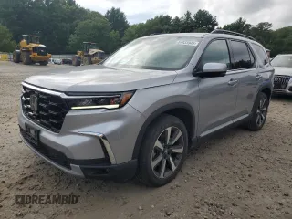 2023 Honda Pilot Touring with VIN 5FNYG1H78PB012799, listed as a Copart auction lot 64933945 with 31,834 mi miles and Salvage title. Bid and sale history available at DreamBid. Image 1.