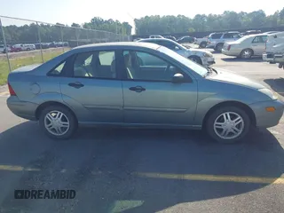 2003 Ford Focus SE with VIN 1FAFP34P13W304346, listed as a IAAI auction lot 42706827 with 239,800 mi miles and . Bid and sale history available at DreamBid. Image 13.