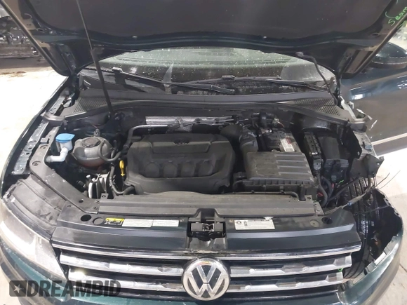 2018 Volkswagen Tiguan SEL with VIN 3VV2B7AX8JM113976, listed as a IAAI auction lot 42310576 with 100,319 mi miles and . Bid and sale history available at DreamBid. Image 10.