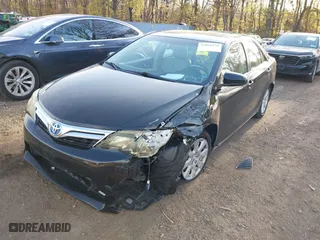 2014 Toyota Camry Hybrid LE with VIN 4T1BD1FK8EU113508, listed as a IAAI auction lot 42068470 with 386,932 mi miles. Bid and sale history available at carsss.com. Image 6.