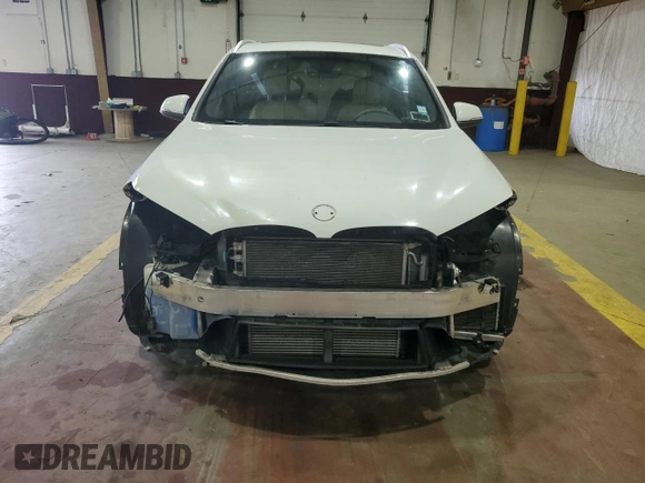 2017 BMW X1 xDrive28i with VIN WBXHT3Z34H4A54811, listed as a Copart auction lot 63584405 with 92,699 mi miles and Salvage title. Bid and sale history available at DreamBid. Image 5.