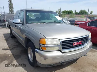 2002 GMC Sierra 1500 SLE with VIN 2GTEC19V821407265, listed as a IAAI auction lot 42087634 with 196,745 mi miles and . Bid and sale history available at carsss.com. Image 1.