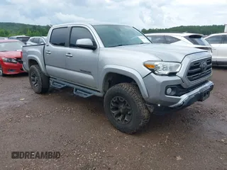 2019 Toyota Tacoma SR5 with VIN 3TMAZ5CN5KM095427, listed as a IAAI auction lot 42237189 with 103,794 mi miles and . Bid and sale history available at DreamBid. Image 1.