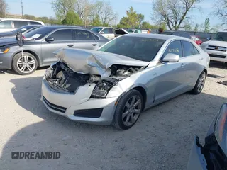 2013 Cadillac ATS Luxury z VIN 1G6AB5RX0D0155670, wystawiony jako IAAI lot #42076118 z przebiegiem 117 084 mil mil oraz . Historia ofert i sprzedaży dostępna na DreamBid. Obrazek 2.