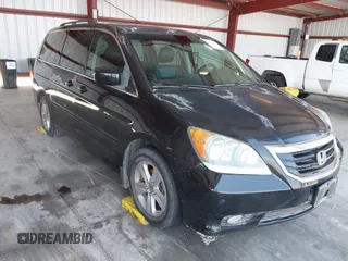 2010 Honda Odyssey Touring with VIN 5FNRL3H97AB022289, listed as a IAAI auction lot 42733089 with 177,966 mi miles and . Bid and sale history available at DreamBid. Image 1.