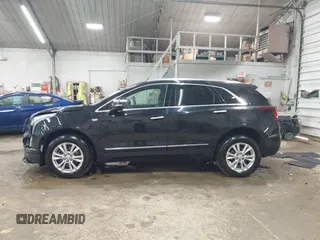 2022 Cadillac XT5 FWD Luxury with VIN 1GYKNAR47NZ100356, listed as a IAAI auction lot 42393314 with 91,492 mi miles and . Bid and sale history available at DreamBid. Image 14.