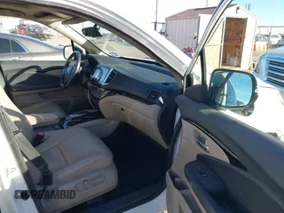 2017 Honda Pilot Touring with VIN 5FNYF6H93HB056387, listed as a IAAI auction lot 41095336 with 90,376 mi miles and . Bid and sale history available at DreamBid. Image 5.