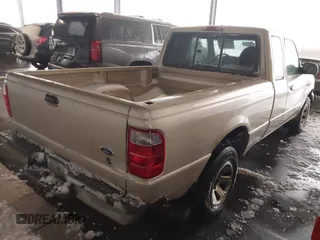 2001 Ford Ranger XL with VIN 1FTYR14V31PB58474, listed as a IAAI auction lot 41806958 with 300,219 mi miles. Bid and sale history available at carsss.com. Image 4.
