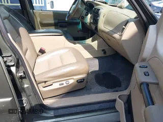 2003 Ford Explorer Sport Trac XLS z VIN 1FMZU67E93UB08190, wystawiony jako IAAI lot #42108621 z przebiegiem 233 972 mil mil oraz . Historia ofert i sprzedaży dostępna na DreamBid. Obrazek 5.