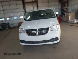2017 Dodge Grand Caravan SE z VIN 2C4RDGBG6HR848612, wystawiony jako IAAI lot #38453498 z przebiegiem 56 964 mil mil oraz . Historia ofert i sprzedaży dostępna na DreamBid. Obrazek 12.