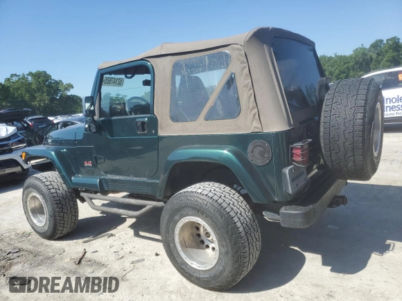 1999 Jeep Wrangler Sahara with VIN 1J4FY49S6XP478675, listed as a Copart auction lot 52147605 with 157,971 mi miles and Salvage Title. Bid and sale history available at carsss.com. Image 2.