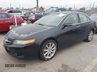 2006 Acura TSX with VIN JH4CL96836C007052, listed as a IAAI auction lot 42792299 with 210,451 mi miles and . Bid and sale history available at DreamBid. Image 2.