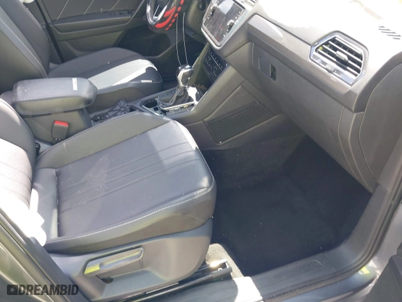2023 Volkswagen Tiguan SE with VIN 3VVNB7AX5PM064693, listed as a IAAI auction lot 42033011 with 38,220 mi miles. Bid and sale history available at carsss.com. Image 5.